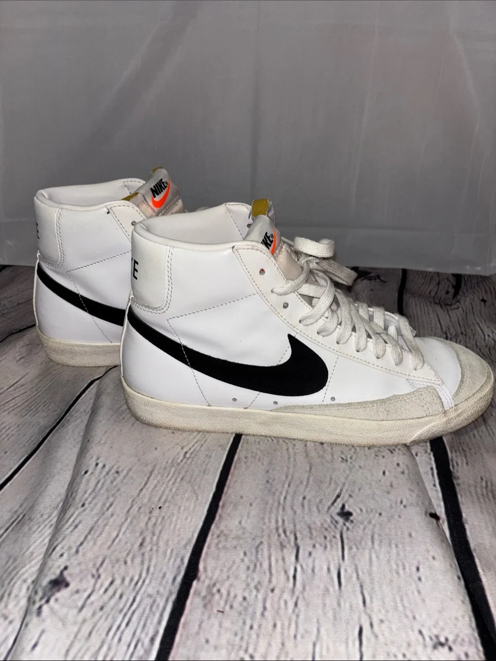 Nike White High-Top Sneakers with Black Stripe